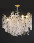 Lustre moderne à branches de 61 à 102 cm (24 à 40 pouces) en verre en forme de pièce de monnaie