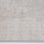 Tapis Melard lavé doux, motif abstrait neutre, sensation de détente et texture rétro, style moderne et doux.