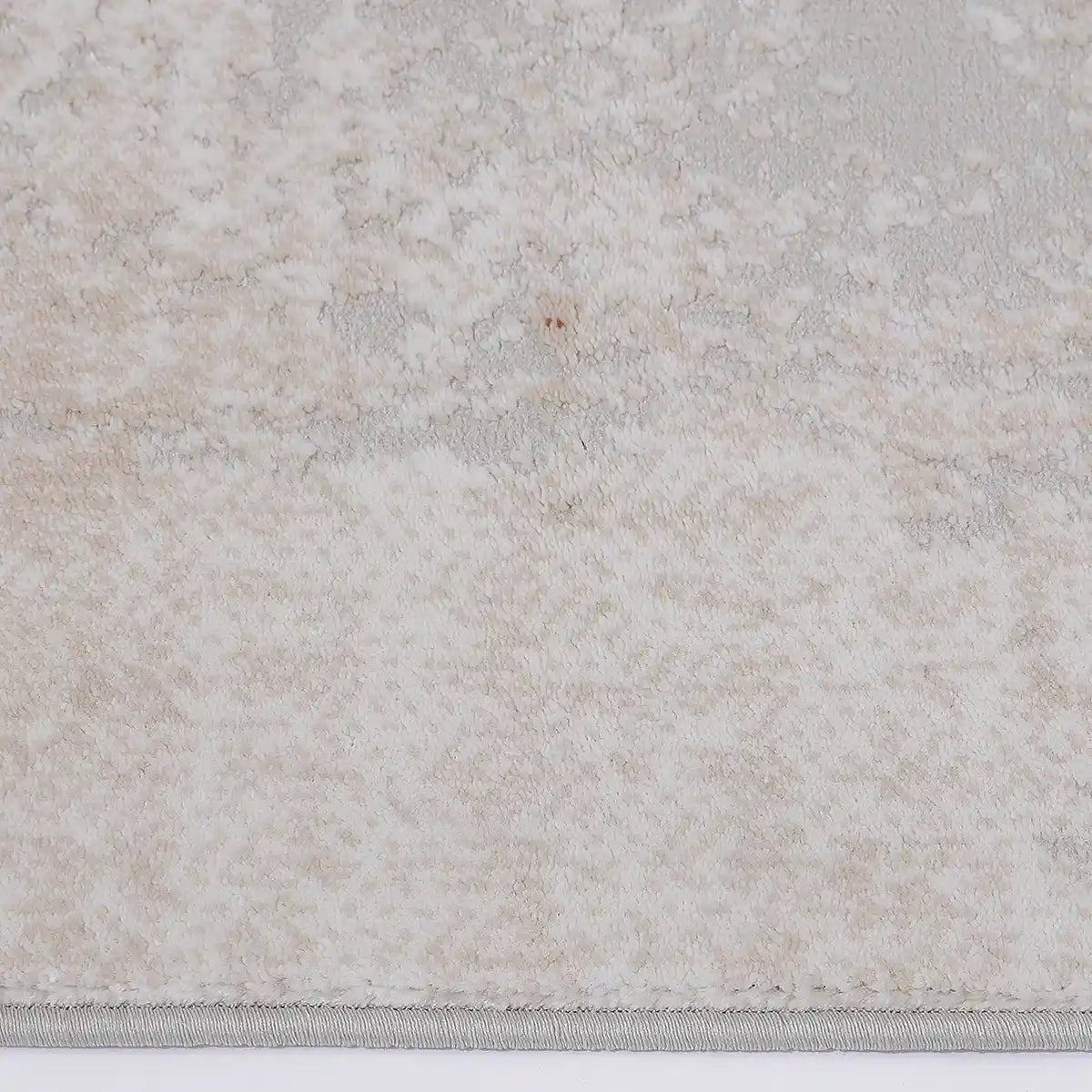 Tapis Melard lavé doux, motif abstrait neutre, sensation de détente et texture rétro, style moderne et doux.